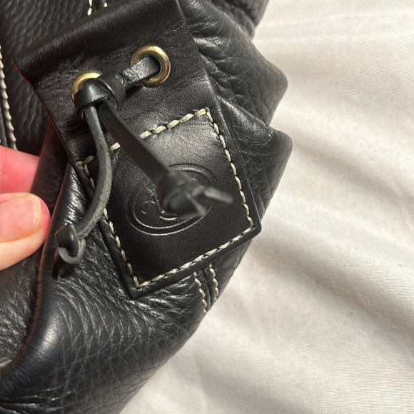 Dooney & Bourke Drawstring bag with tassels and duck tag. - Picture 6 of 12